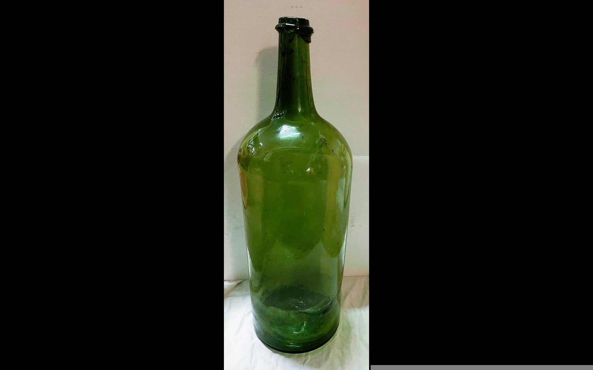 Bottiglioni d'epoca in vetro soffiato - lavorazione artigianale tradizionale